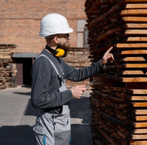 man-working-mdf-boards-warehouse_23-2149384857